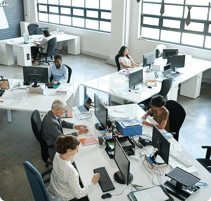 The IT-TECH team collaborating in the office